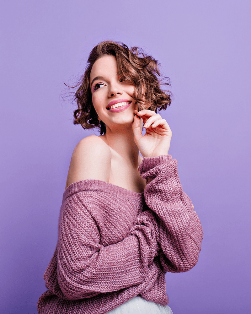 girl wearing lavender sweatshirt